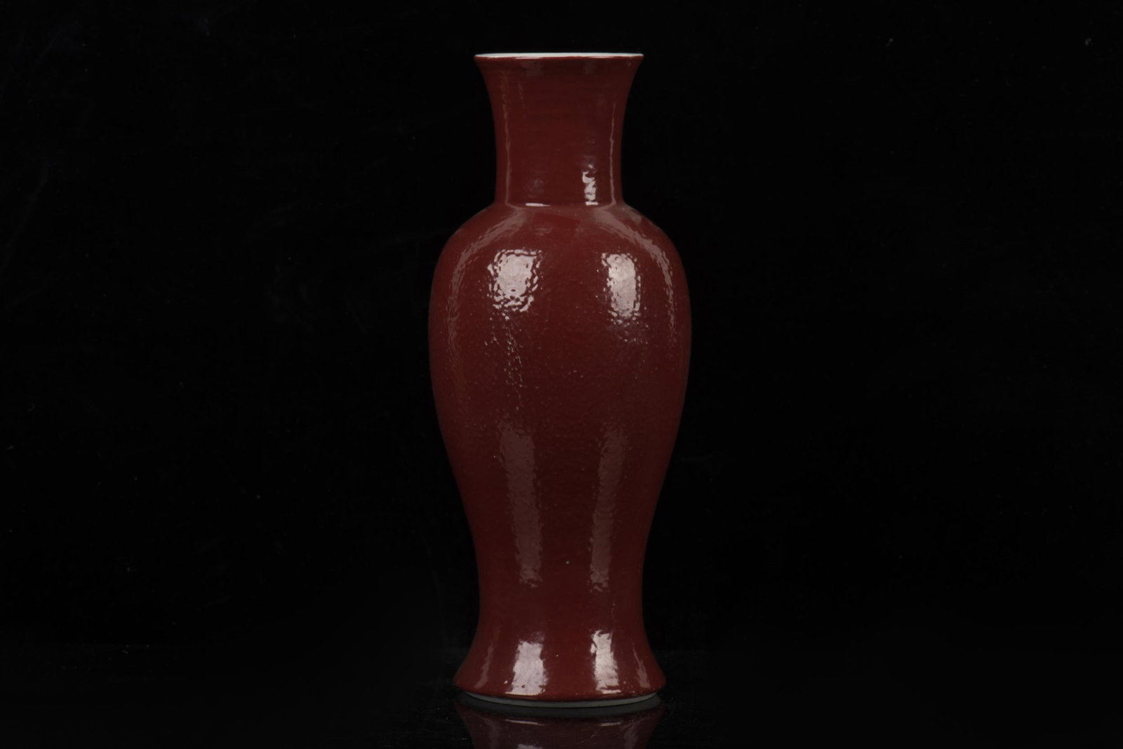 MONOCHROME RED GLAZED AND 'ORANGE PEEL' SURFACE VASE (1 of 5)