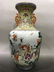 A CHINESE FAMILLE ROSE PORCELAIN VASE WITH DOUBLE EARS
