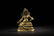 GILT BRONZE CAST 'YELLOW JAMBHALA' SEATED FIGURE - 2