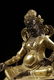 GILT BRONZE CAST 'YELLOW JAMBHALA' SEATED FIGURE - 3