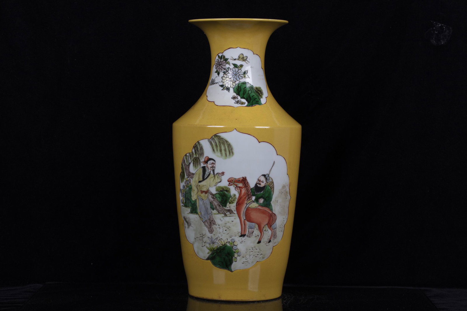 FAMILLE ROSE YELLOW GROUND AND OPEN MEDALLION 'PEOPLE': 粉彩黃地開光人物故事瓶 Famille rose yellow ground and open medallion 'People' vase Height: 15 in (38.1 cm)