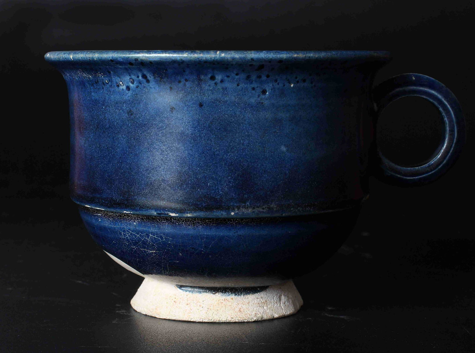 A CHINESE BLUE GLAZED CUP,TANG DYNASTY (1 of 8)
