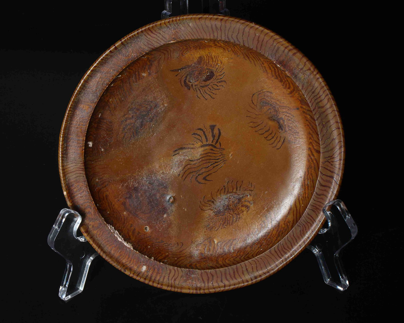 A CHINESE POTTERY DISH, TANG DYNASTY (1 of 7)