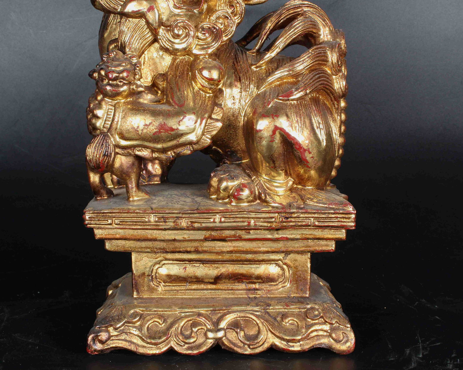 A PAIR OF CHINESE WOODEN LION STATUES PAINTED WITH (1 of 8)