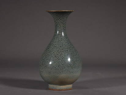 LONGQUAN WARE CELADON GLAZED VASE: 龙泉溪口玉壶春瓶 Longquan ware celadon glazed vase Length: 7 1/2 in (19.0 cm) Width: 3 7/8 in (10.0 cm)