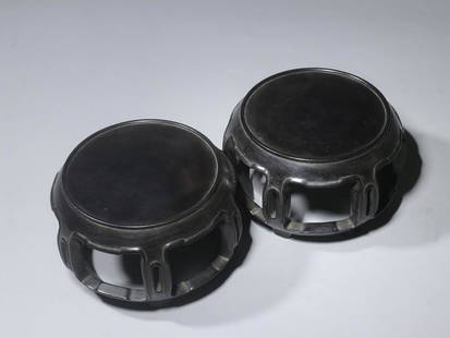 PAIR OF ZITAN WOOD CARVED ROUND STANDS: 小叶紫檀鼓形底座一对 Pair of Zitan wood carved round stands Height: 3 1/2 in (8.8 cm) Diameter: 4 5/8 in (11.5 cm)