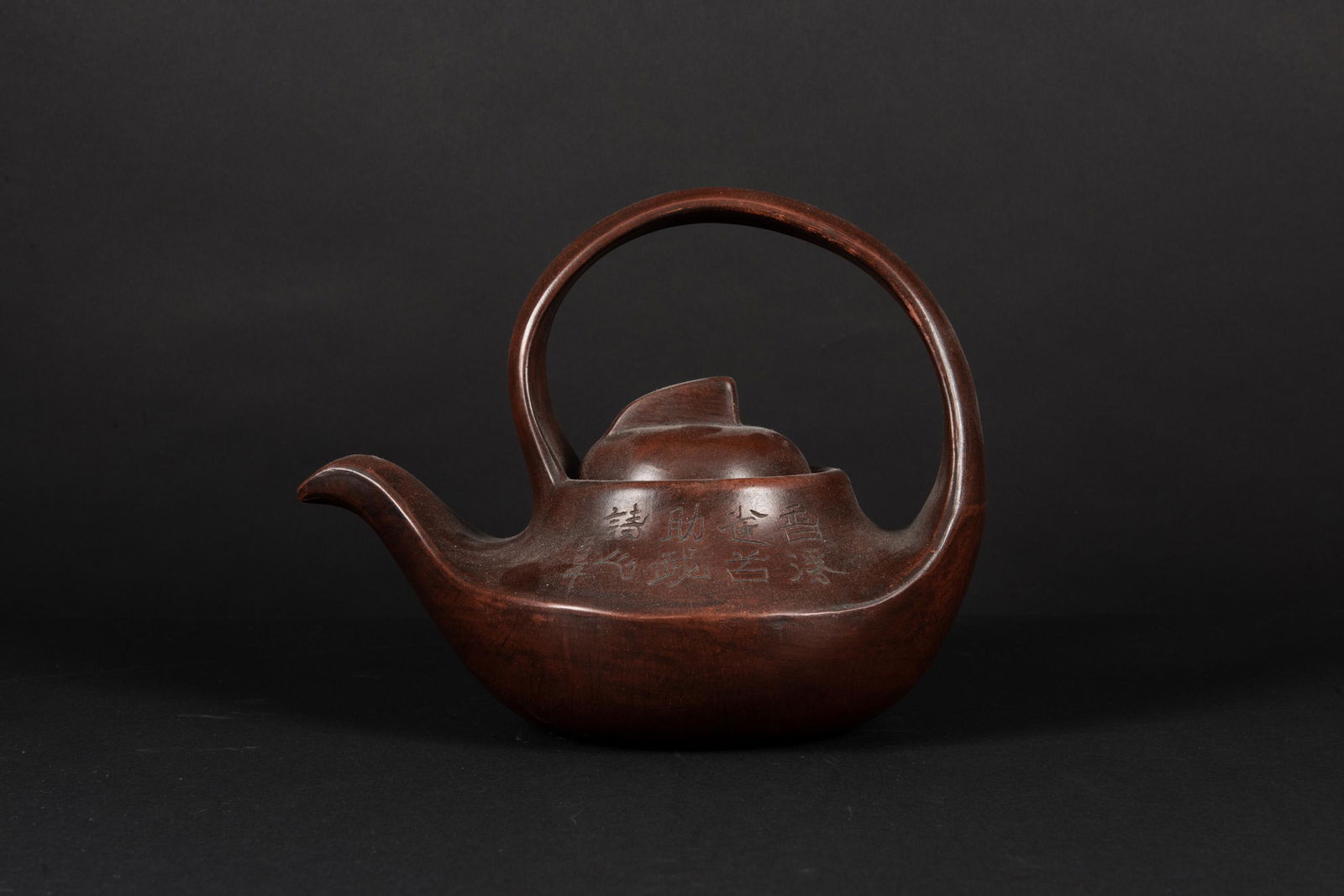 ZISHA TEAPOT: 紫砂刻字茶壺 zisha teapot Height: 8 1/2 in (21.6 cm) Width: 10 1/2 in (26.7 cm)