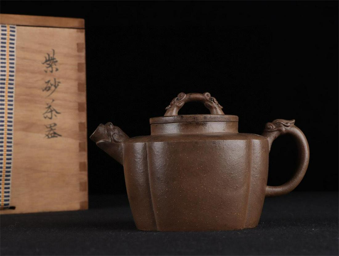 ZISHA TEAPOT BY CHEN WENBO: 青灰段泥龙韵壶 底款：陈文伯 清代 Zisha teapot by Chen Wenbo Height: 3 2/8 in (8.0 cm) Width: 5 3/8 in (13.5 cm
