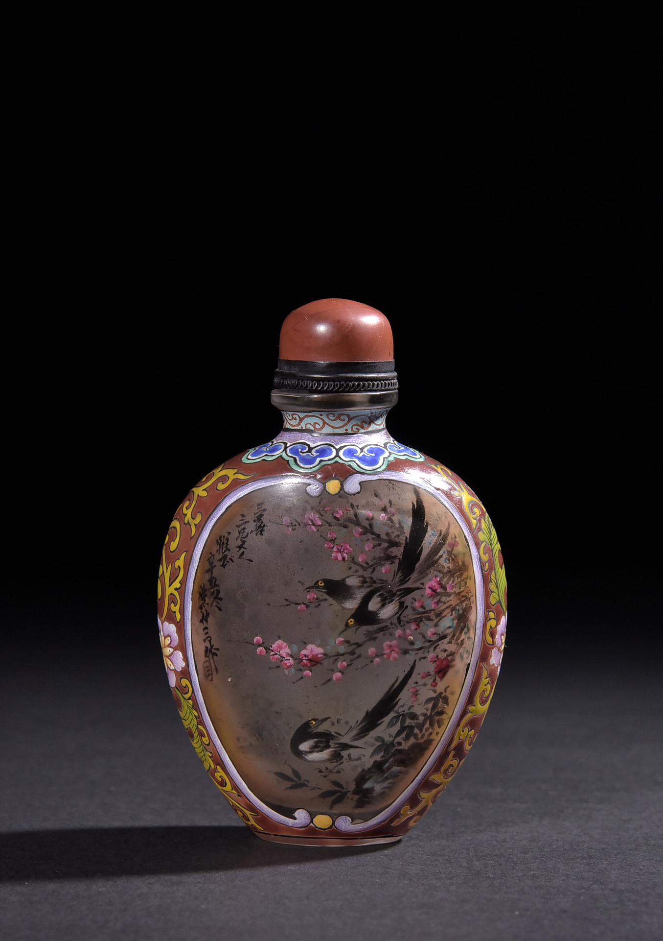 INSIDE PAINTED 'FLOWERS AND BIRDS' GLASS SNUFF BOTTLE: 清.琉璃加彩手绘喜鹊登梅鼻烟壶 Inside painted 'Flowers and Birds' glass snuff bottle Height: 3 5/8 in (8.9 cm) Length