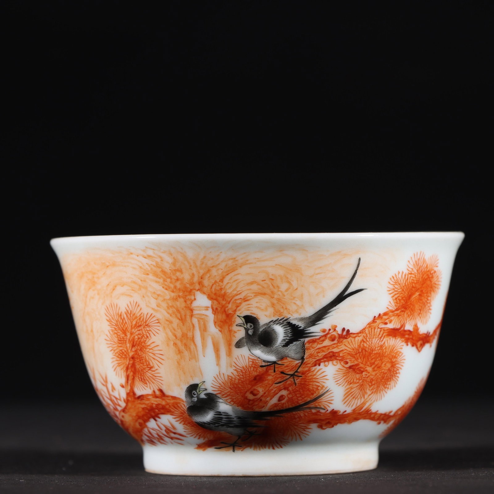 QING YONGZHENG YEAR ALUM RED FLOWERS AND BIRD BOWL: 清代雍正矾红彩花鸟杯 Qing Yongzheng year alum red flowers and bird bowl Height: 1 7/8 in (4.8 cm) Width: 3 2/8 in (8.2 cm)