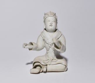 WHITE PORCELAIN FIGURE