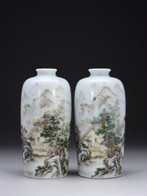 A PAIR OF FAMILLE ROSE PAVILION PLUM VASES