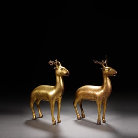 A PAIR OF GILDED COPPER AUSPICIOUS DEER