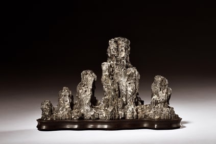PORCELAIN MOULDED AND CARVED 'SCHOLAR STONES' BRUSH REST