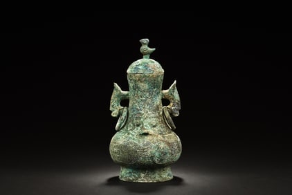 ARCHAIC BRONZE CAST 'MYTHICAL BEAST' VASE WITH LID