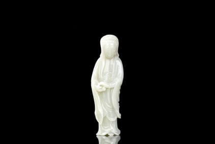 CELADON JADE CARVED 'GUANYIN' STANDING FIGURE