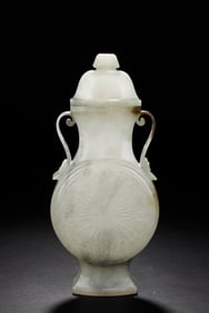 A WHITE JADE CARVED MUGHAL STYLE MOONFLASK