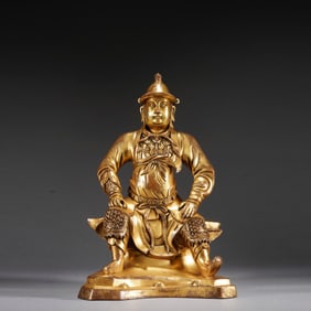 QING DYNASTY, GILDED COPPER HEAVENLY OFFICIAL SEATED STATUE