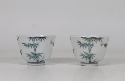 QING YONGZHENG YEAR BUCKET COLOR PINE, BAMBOO AND PLUM PAIR CUPS