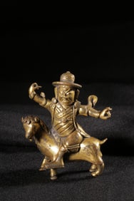 QING DYNASTY COPPER GILT SHEEP GUARDIAN ORNAMENT