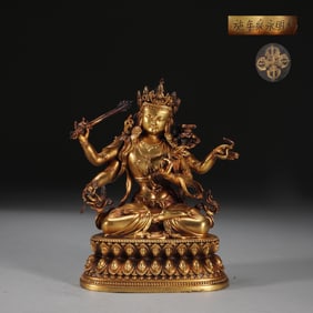 MING FINELY CAST GILT BRONZE FOUR-ARMED MANJUSHRI BODHISATTVA SEATED STATUE, WEIGHT 1.6 KG