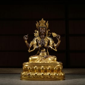 QING DYNASTY'S "GILDED COPPER FOUR-ARMED GUANYIN SEATED STATUE"