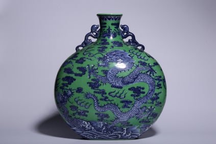 QING DYNASTY "QIANLONG YEAR" GREEN GLAZE BLUE AND WHITE SEA DRAGON PATTERN MOON BOTTLE