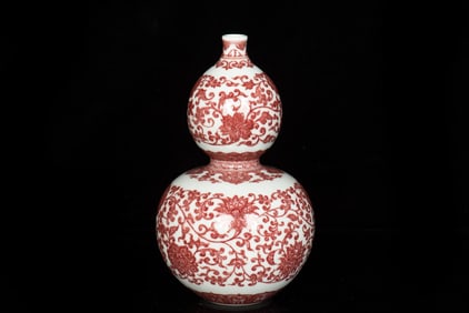 UNDERGLAZED RED 'FLOWERS AND VINES' DOUBLE GOURD VASE