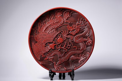 QIANLONG YEAR RED CARVED DRAGON AND PHOENIX PATTERN PLATE