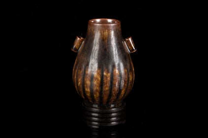 SMALL RUSSET-GLAZED MELON-FORM VASE WITH STAND