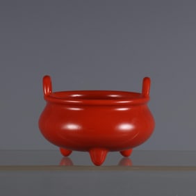 QING YONGZHENG YEAR CORAL RED GLAZE THREE-LEGGED BURNER