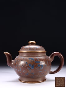 QIANLONG PERIOD OF THE QING DYNASTY, PURPLE CLAY WITH COLORED AND GOLD-PAINTED PALACE LANTERN POT