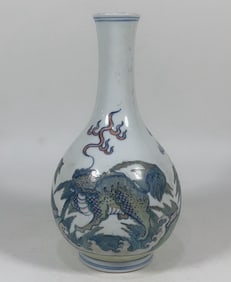 QING KANGXI YEAR DOUCAI THREE BEAST LONG-NECKED BOTTLES, APPEARANCE COMPLETE