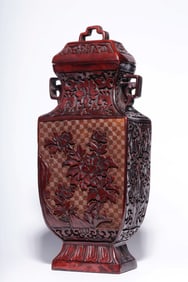 ?MADE IN THE QIANLONG PERIOD OF THE QING DYNASTY? RED CARVED FLOWER-COVERED VASE