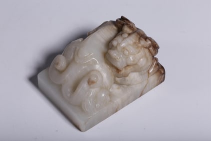 QING DYNASTY HETIAN WHITE JADE TIANLU AUSPICIOUS BEAST PAPERWEIGHT