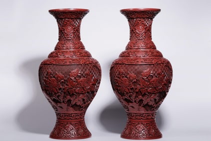 A PAIR OF RED CARVED FLOWER-PATTERNED APPRECIATION VASES