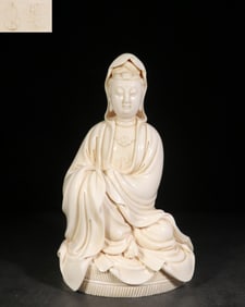DEHUA, HE CHAOZONG STYLE LARD-WHITE SEATED GUANYIN ORNAMENT