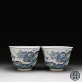 DOUCAI DRAGON-PATTERNED BELL CUPS MADE IN THE YONGZHENG PERIOD OF THE QING DYNASTY