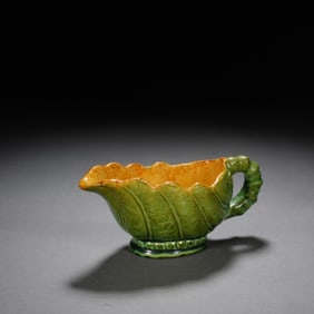 QING DYNASTY, A CUP WITH GREEN GLAZE EARS