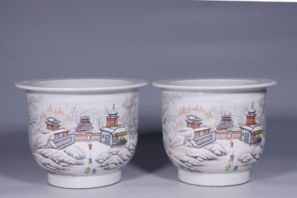 REPUBLIC OF CHINA, A PAIR OF PINK ENAMEL FLOWER POTS WITH SNOW SCENE, INSCRIBED BY HE XUREN