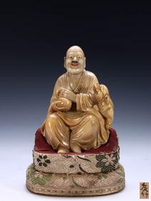 QING. YOUZHU SHOUSHAN FURONG STONE CARVING LION-PLAYING ARHAT STATUE
