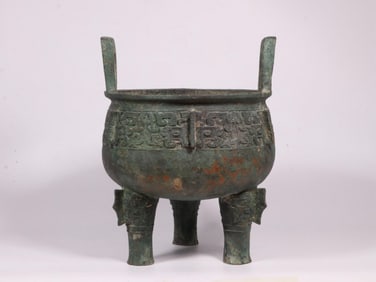BRONZE BEAST-FACED TRIPOD