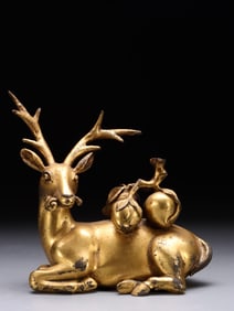 QING DYNASTY. COPPER GILT DEER HOLDING GANODERMA LUCIDUM AND CARRYING LONGEVITY PEACHES FOR STUDY