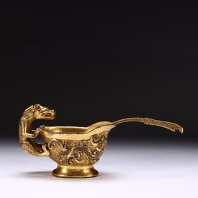 QING DYNASTY. GILDED COPPER. WATER CONTAINER WITH AUSPICIOUS ANIMAL PATTERNS