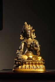 QING DYNASTY GILT BRONZE SITTING STATUE OF GREEN TARA INLAID WITH TREASURES