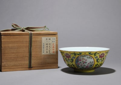 A YELLOW-GROUND FLORAL BOWL