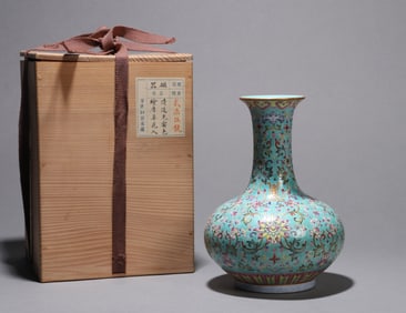 A TURQUOISE-GROUND FAMILLE-ROSE FLORAL VASE