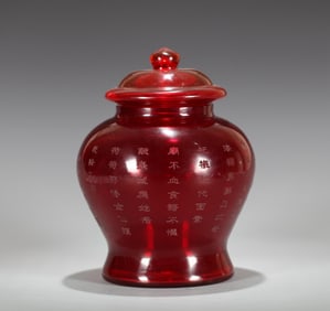 A RED GLASS JAR