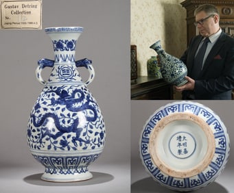 A BLUE AND WHITE DRAGON VASE