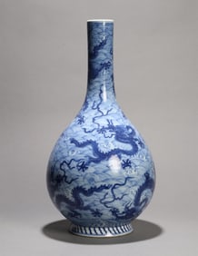 A RESERVE-DECORATED BLUE AND WHITE DRAGON VASE